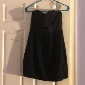 Black mini dress with bow and lace detail